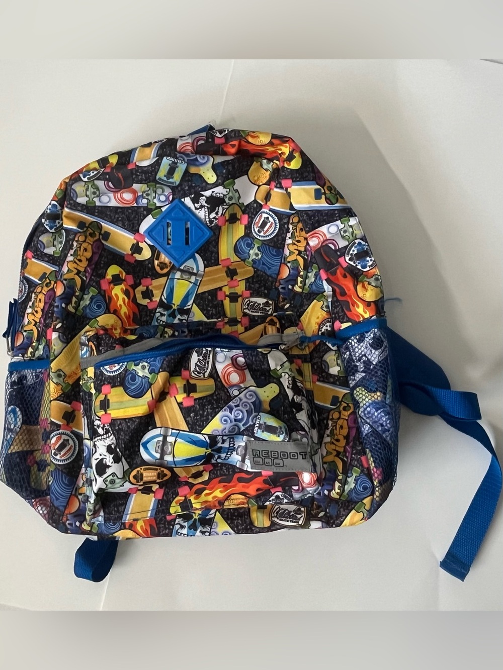This Reboot Kids Blue Multi-Print Backpack - Fun Skateboard Pattern